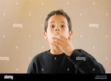 Young Boy In Shock Gesture Stock Photo Alamy