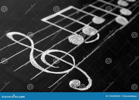 Music Scale With Treble Clef And Notes On Chalkboard Stock Photo