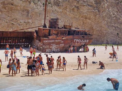 Visitors And Rusted Shipwreck Navagio Beach Zakynthos Greek Island