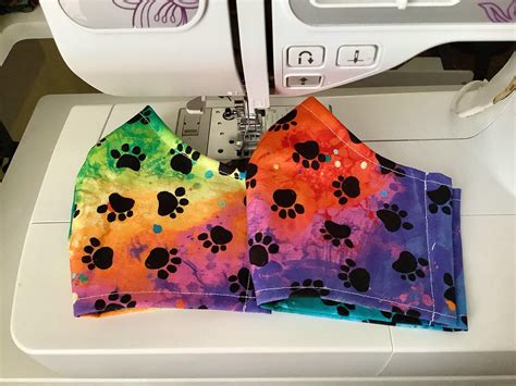 this rainbow paw print fabric is so cute if you messaged and i haven t replied yet i