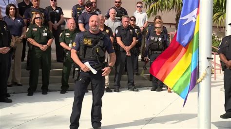 Pride flag raised at West Palm Beach Police Department - YouTube