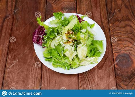 Salad Of Lettuce On Dish On Old Rustic Table Stock Image Image Of