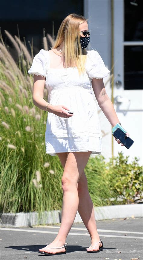 Sophie Turner Wearing A White Mini Dress While Out For Lunch In
