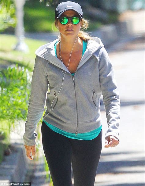 Pregnant Stacy Keibler Covers Up Her Bump With A Loose Jacket As She