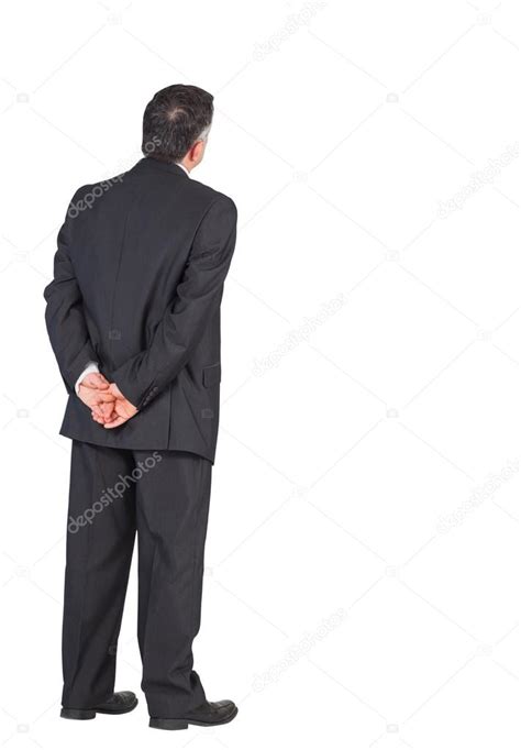 Mature Businessman With Hands Behind Back Stock Photo By