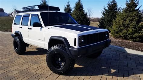 Every used car for sale comes with a free carfax report. 1998 Jeep Cherokee Sport XJ 4X4 LOW Miles Fresh BUILD for sale