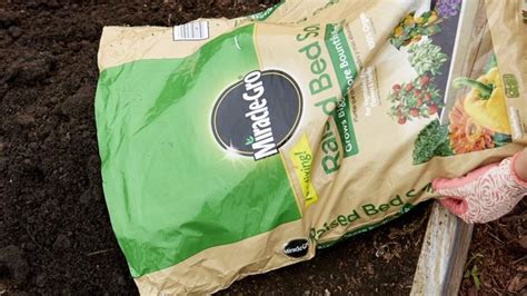 Do you throw away old potting soil? Raised Bed Crop Rotation Made Easy | Miracle-Gro