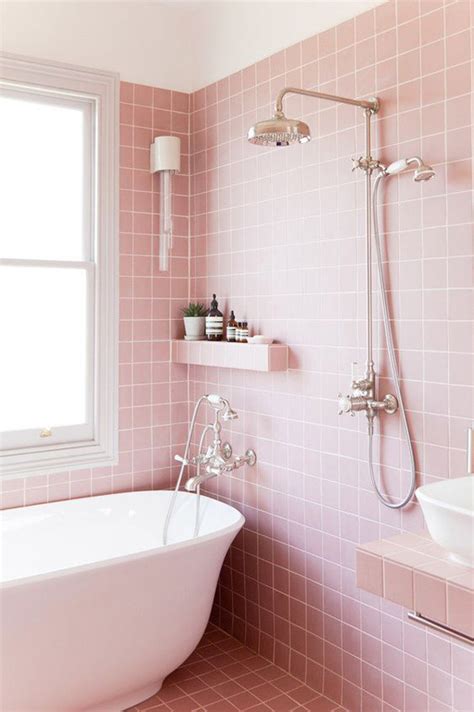 The pink straight tiles on the bathroom walls are modern and seem to bring the grey wall to life. 20 Pretty Ways To Bring A Pink Colors Into Your Bathroom ...