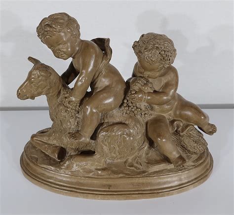 Sculpture En Terre Cuite Patinée Putti Jouant Sur Une Chèvre