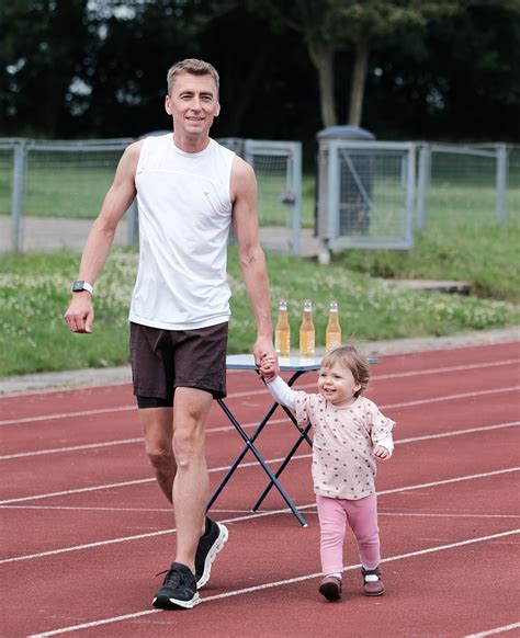 Father And Daughter At The Track After The Beer Mile Race Flickr