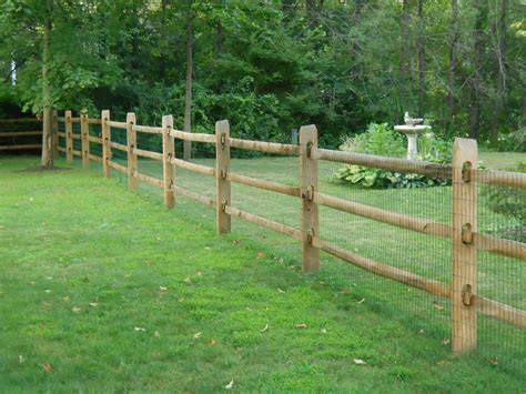 Split rail fencing is a simple but common fence used in paddocks and fields, a very popular and rustic fence for any large home or farm. split rail fence with wire backing | This is a split rail ...