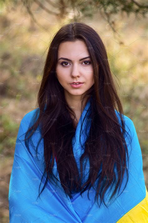 Beautiful Brunette Model Posing In A Park With Flag Of Ukraine People
