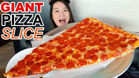 Eating The World S Largest Pizza Slice In New York City Pizza Barn Super Slice Challenge