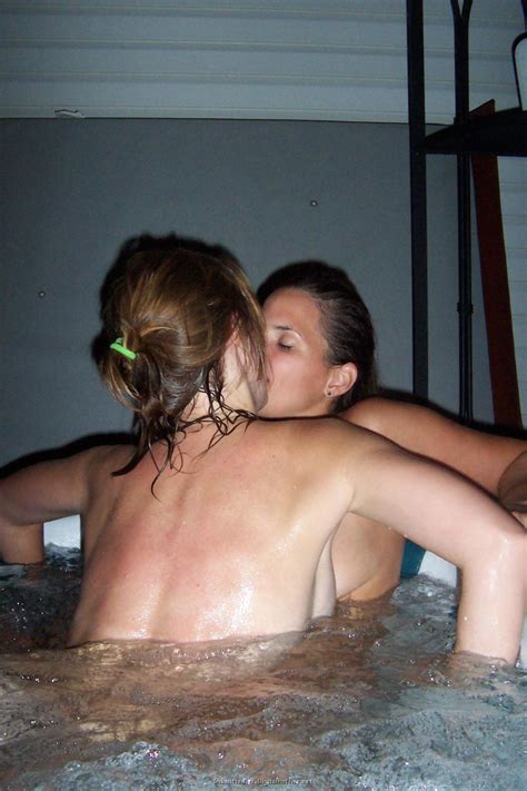 Two Lesbians Enjoying Each Other In A Hot Tub