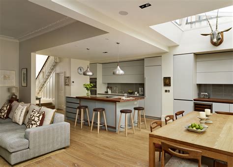 This Neutral Bespoke Roundhouse Kitchen Features Handleless Draws And