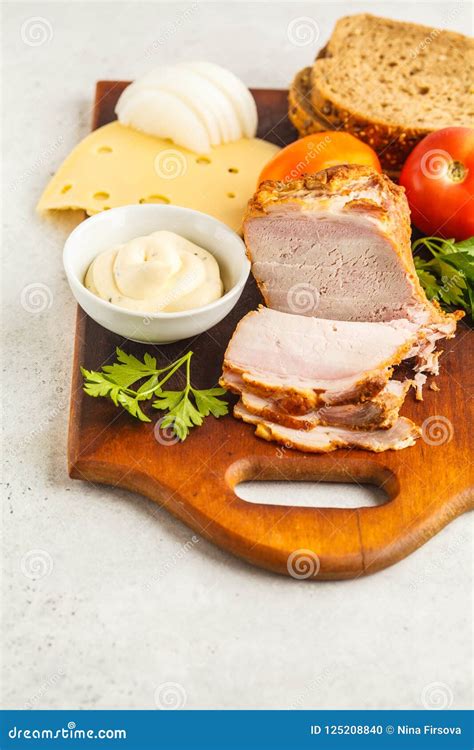 Ingredients For Ham And Cheese Sandwiches On A Wooden Board White