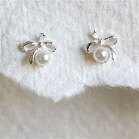 Tiny Sterling Silver Bow Pearl Stud Earrings By The Carriage Trade