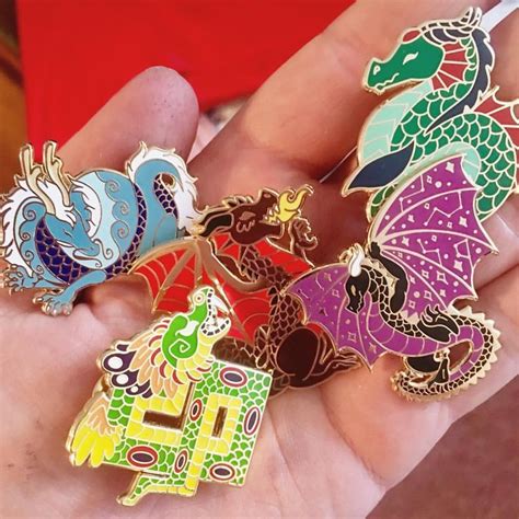 my dragon pins finally came in find them on etsy 👌🏻 enamelpin pins pingame artist