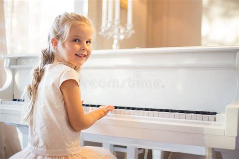 2827 Little Girl Playing Piano Stock Photos Free And Royalty Free