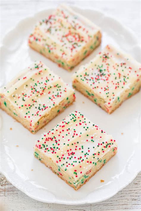 The only thing better than a cookie is a cookie with filling. Holiday Sugar Cookie Bars with Cream Cheese Frosting ...