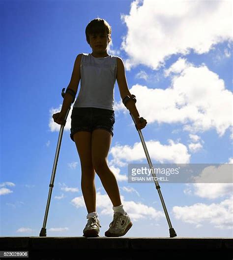 Girl Crutches Photos And Premium High Res Pictures Getty Images