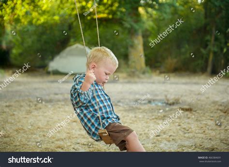 Sad Lonely Boy Sitting On Swing Stock Photo 466384691 Shutterstock