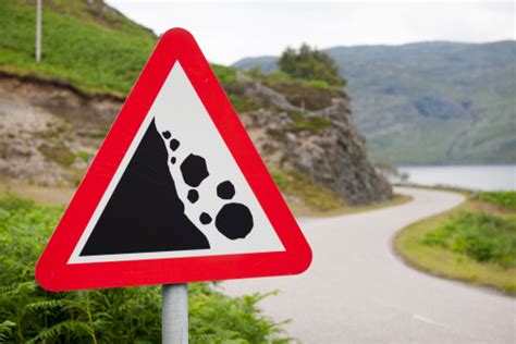 Falling Rocks Warning Road Sign Stock Photo Download Image Now Istock