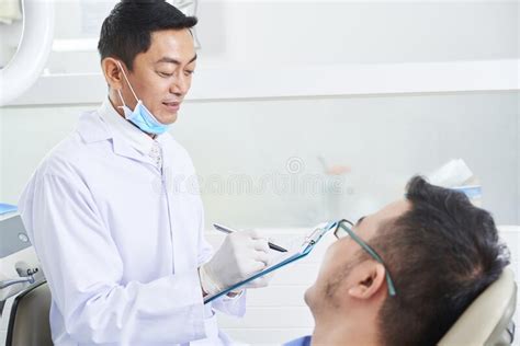 Asian Male Dentist At Work Stock Photo Image Of Looking 170483538