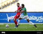 Mahdi Faisal Alhumaidan (L) of Bahrain and Md Rimon Hossain (R) of ...