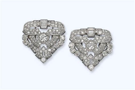 A Pair Of Art Deco Diamond Brooches Christies
