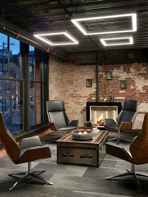 Industrial Office Features Exposed Bricks And Concrete Ceilings Modern
