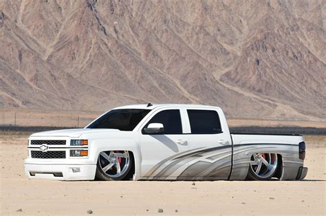 White Customized Chevy Silverado Dropped to the Ground — CARiD.com Gallery