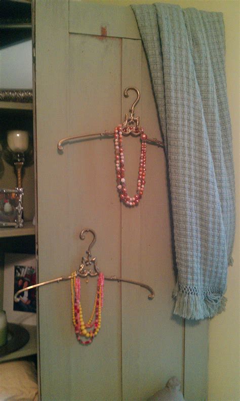 Discover the best ways to decorate a small bedroom. decoration in my bedroom....antique hangers with unique ...