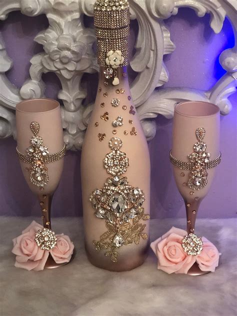 Remove the sticker from the wine glass. Champagne set | Etsy | Glitter wine bottles, Diy bottle crafts, Bedazzled liquor bottles