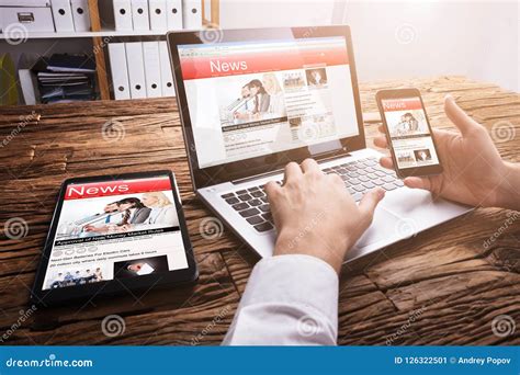 Businessperson Reading Online News On Laptop Stock Image Image Of