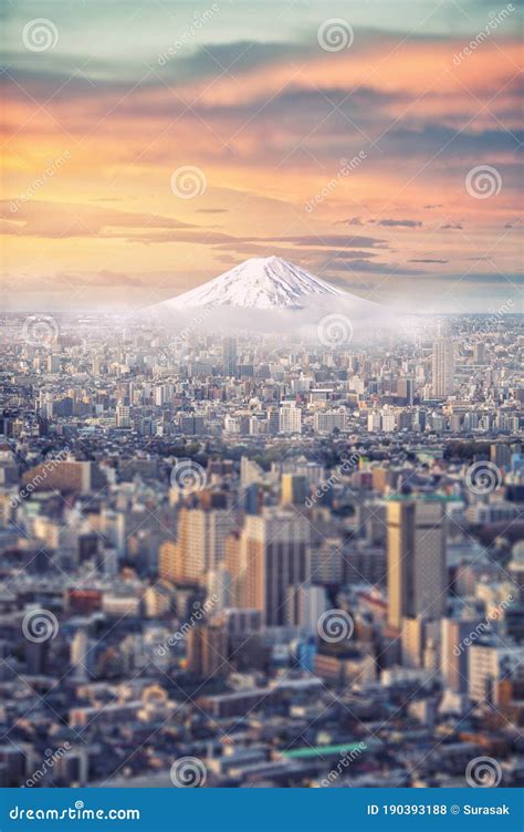 Retouch Mtfuji Covered With Snow And Japan Cityscape On The Sky In