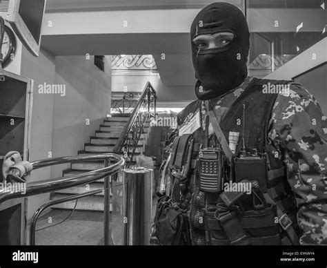 April 21 2014 Pro Russian Masked Fighter Guards The Entrance Inside The Building Of The