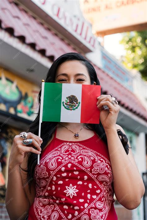 Premium Photo Woman Holding Mexican Flag In The Street
