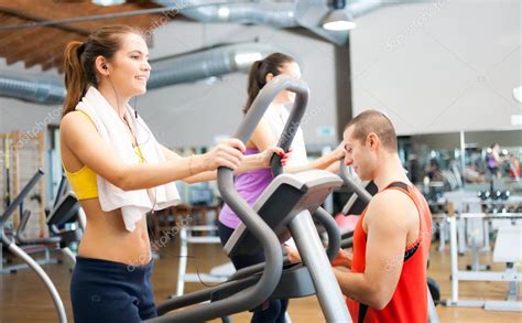 People Working Out In A Gym — Stock Photo © Minervastock 48100993