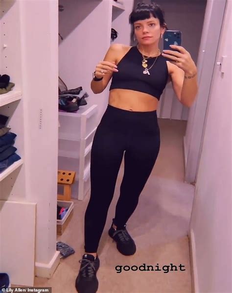 lily allen displays her taut midriff in a black crop top and matching leggings daily mail online