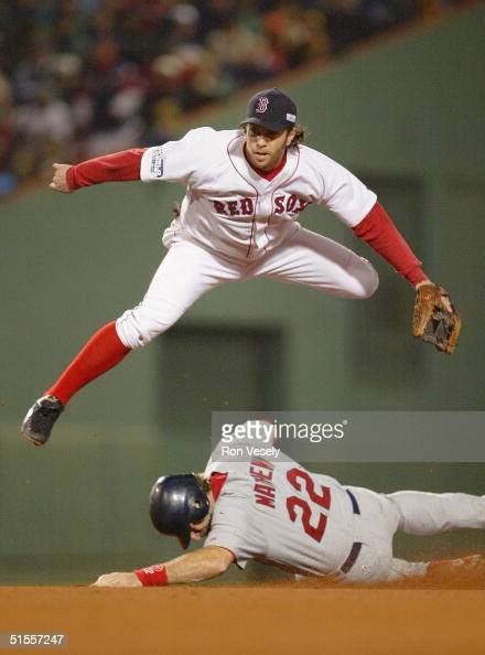 Mark Bellhorn Of The Boston Red Sox Turns A Double Play As Mike News