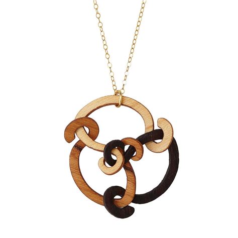 Maybe you would like to learn more about one of these? Trinity Wooden Necklace | celtic knot necklace | UncommonGoods