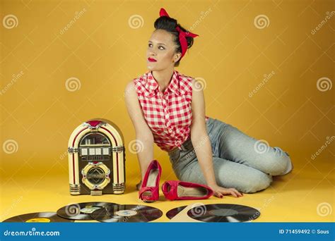 Portrait Beautiful Pin Up Listening To Music On An Old Jukebox R Stock