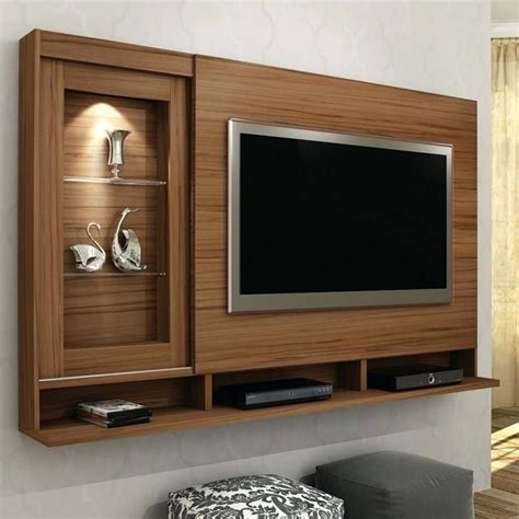 The pictures of loved ones and friends can be kept in a single space. Tv Wall Panel Designs Wall Showcase Designs For Hall Led ...