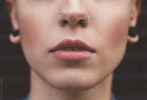 Close Up Of Young Woman With Nose Piercings Stocksy United