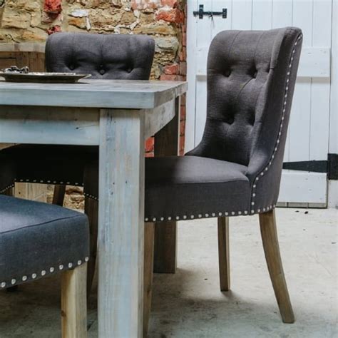 Upholstered in premium faux leather, the chair seat is. Grey Washed Wood Upholstered Dining Chair from Curiosity ...