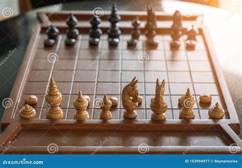 Wooden Chess Board Game With Chess Pieces Ready To Play Stock Image