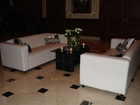 White Leather Couches In The Lobby Of The Townsend Hotel For A Wedding