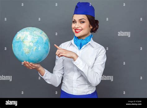 Professional Occupation Stewardess Standing Isolated On Grey Pointing