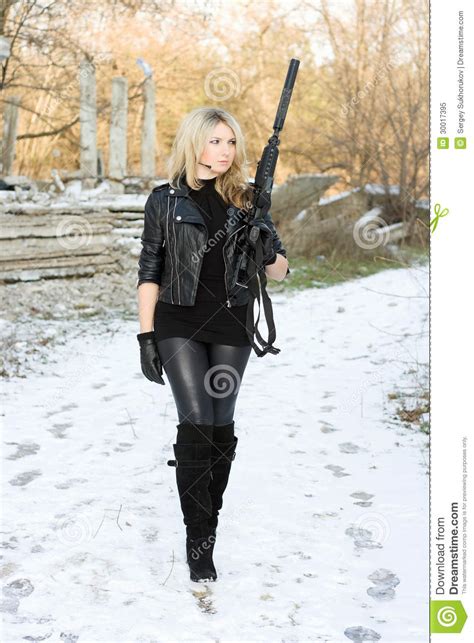 Pretty Young Woman With A Gun Royalty Free Stock Photo Image 30017395
